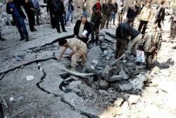 Twin car bombs kill dozens in Damascus 