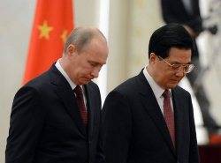 China defends stance with Russia on Syria