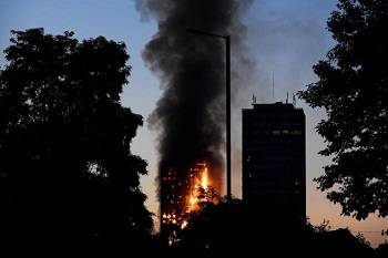 Huge fire engulfs tower block in west London